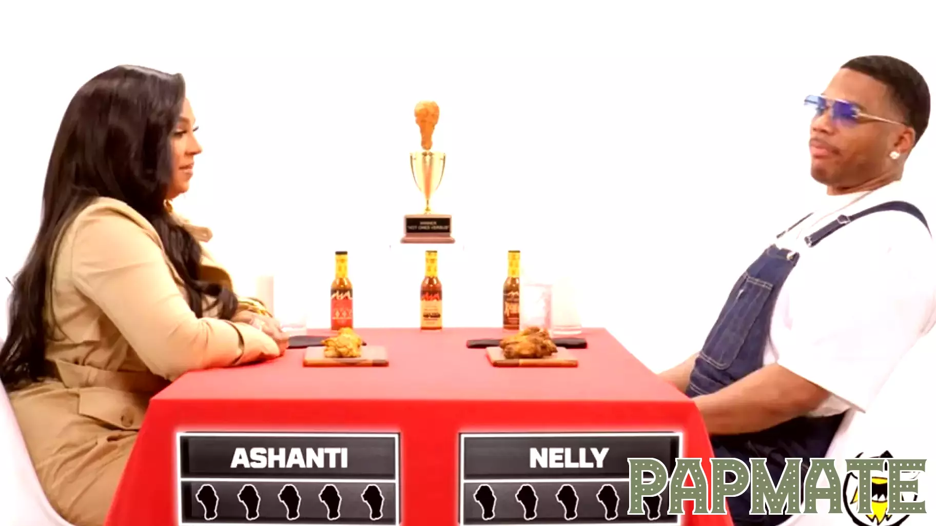 Nelly and Ashanti Discuss Fashion and Parenting on 'Hot Ones Versus'